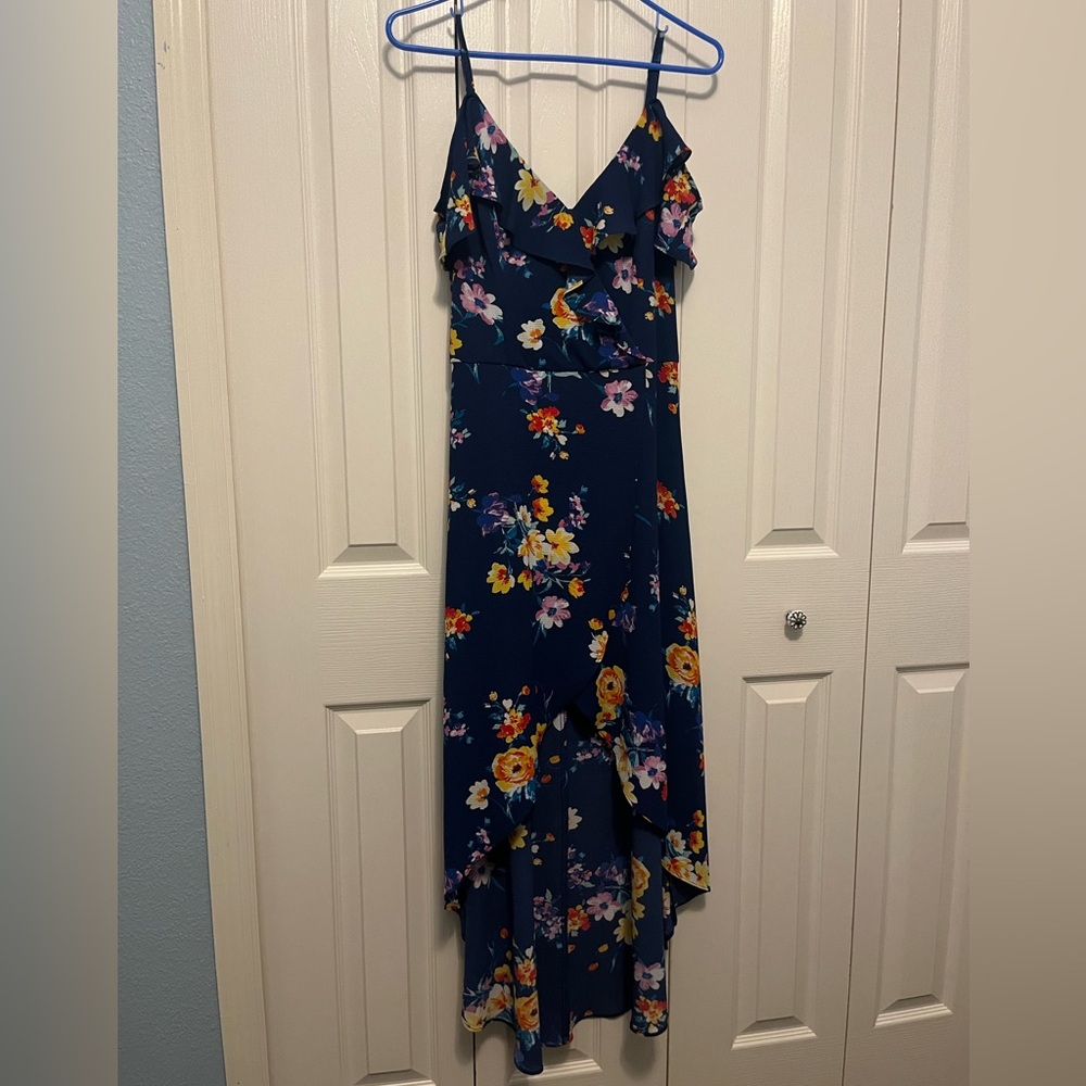 Blue floral dress. High low hem. Spaghetti straps. Size 9